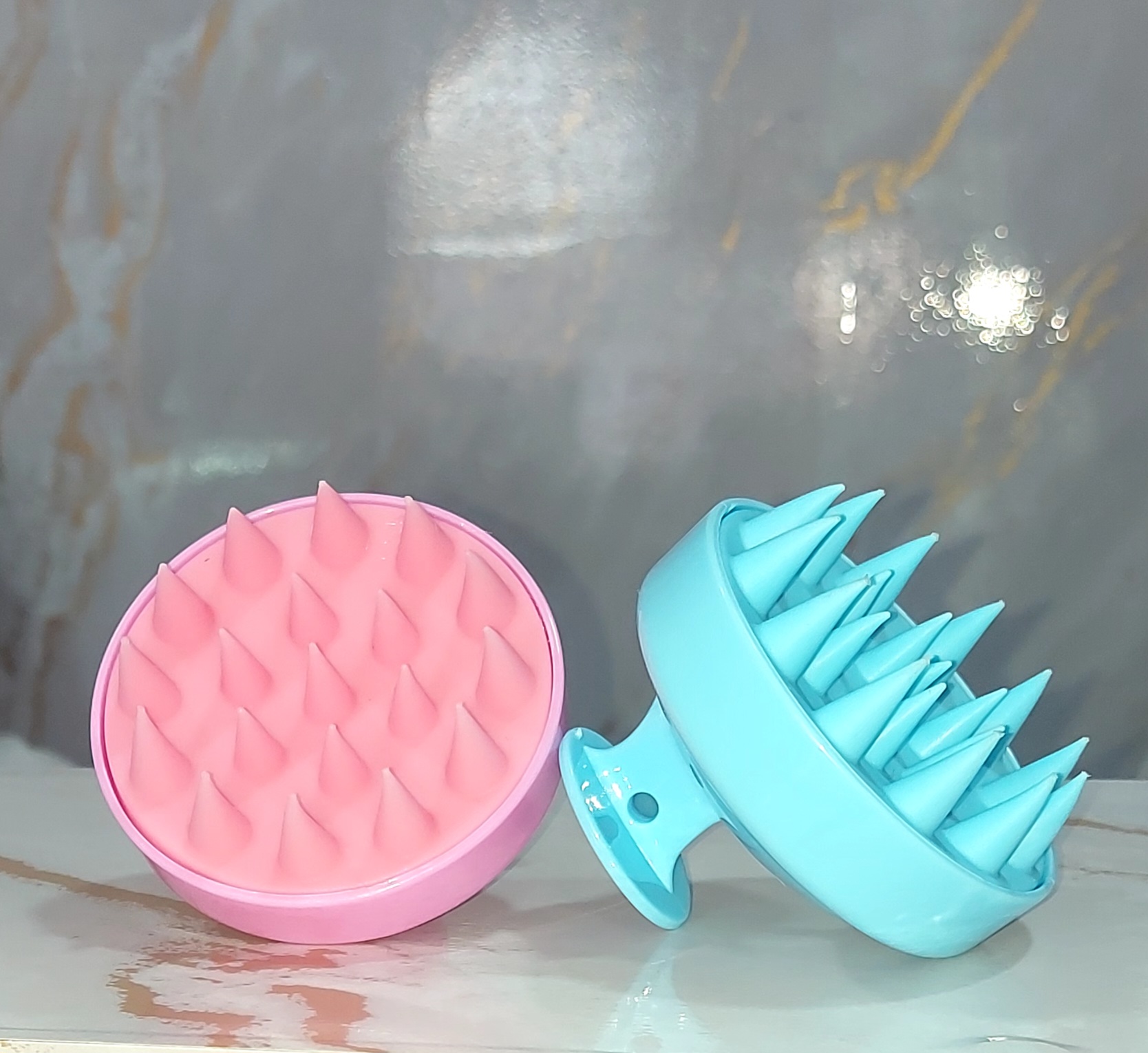 Cepillo masajeador de cuero cabelludo